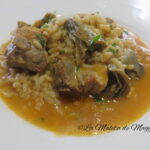 arroz caldoso con alcachofas y costillas